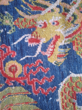 Tibetan Khagangma with a dragon and bird Phoenix. Probably 1930's.  Wool on cotton. 
Dense weave and superp wool and colors.
A little gem.
Just back from professional cleaning. 
One side needs attention 
65x59  ...