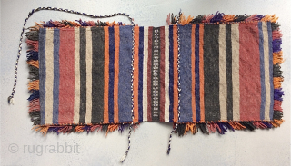Persian double saddlebag Khorjin 

34.5 in (88 cm) x 15 in (37.5 cm). 20th century, possibly 1920s.

Intact.  In good condition.  Decorative fringes with some fading, presumably some aniline dye.

Contact:   ...
