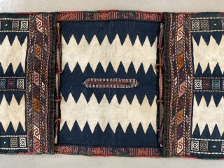 Caucasian double saddle bag khorjin. Blue and white with wool and cotton.  Embroidered.  Stripped in back.  Intact & complete. 53" x 19"

Contact:  zeigercap@gmail.com      