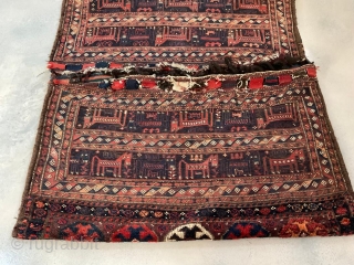 This antique Bakhtiari or Luri Camel Bag, dating back circa 1900, is a stunning piece of decor for collectors of decorative items. With its Sumak weave and piled ends, this camel bag  ...