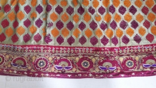 The Antique textile is an intricately embroidered skirt known as ari or mochi embroidery from kutch region in state of Gujarat Approx 1900 century. A type of chain stitch done with the  ...