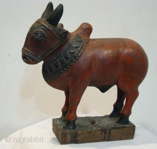  Ethnic Wooden Toy Nandi (Bull), from Maharashtra ( Central India ).

 Very Good Condition , Teak Wood.

 Size: 9 x 27 x 28 cms

 

       