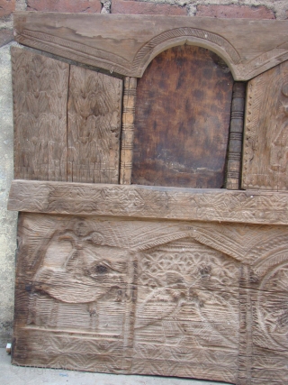 Wooden Tribal House Window.

 Tribal Window from Himachal Pradesh. North India

 Very good Carving Tribal Figures.

 They all are In Parts.

 Size: 6 Feet X 4 Feet

 200 Years Old Piece  