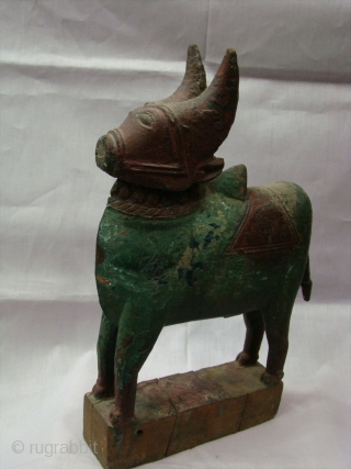  Wooden polycrome Nandi(Bull) Toy.

 a Nandi for childrens from Central Maharashtra (Central India).

 a Nandi use as a Toy for Special yearly festival of Maharashtra name as ( Pola festival). a  ...