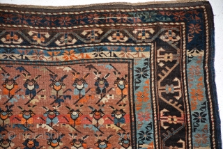 A very unusual Karabagh rug, ca 1900, fair condition, very charming, it's size is 261 x 129 cm.               