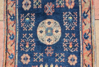 Rare small Khotan runner with beautiful elements, end 19th century, size is 202 x 66 cm                 