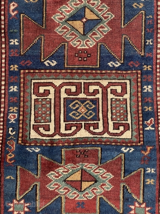 Antique Kazak dated rug low pile but overall it is in good condition. Size is 148 x 86 cm              