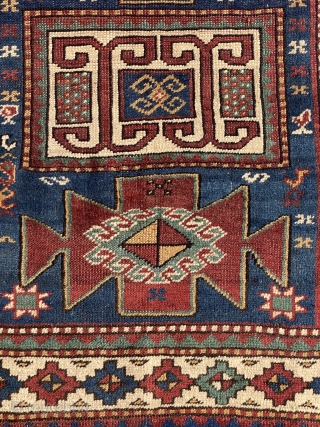 Antique Kazak dated rug low pile but overall it is in good condition. Size is 148 x 86 cm              