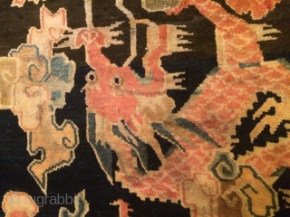 Circa 1925, Dragon and Pheonix rug.  Good age and Good condition . 
Feel free to ask more info.
              