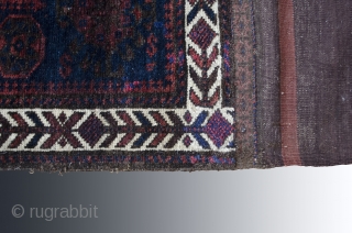 #Antique Baluch bagface 

Wonderfully preserved with minor restored section.
Juicy Velvet pile in deep shades of aubergine and indigo.
Composition consists of nice central bird motif framed with dynamic asymetrical border.
#antique #baluch #saddlebag #rug  ...