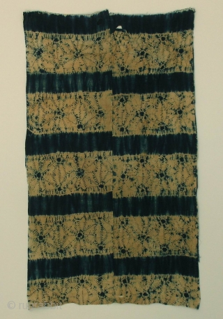 Indigo Kumo shibori koshimaki , Japan, late Meiji (c.1900), 111x65cm. The common English translation of the Japanese word shibori is "tie-dye"; however, a more accurate translation is "shaped-resist dyeing," which describes the  ...