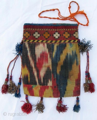  Rare antique Uzbek money bag, IKAT, cross-stitched embroidery is VERY thin, late 19th, in good condition. Size is 7" x 5.5", 17 x 13 cm.       