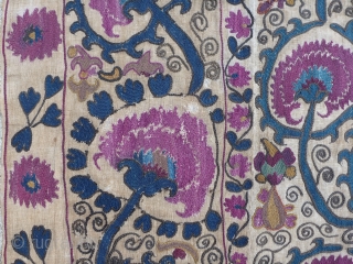 Beautiful antique Uzbek Suzani from the Ura Tube region, which is now in Tajikistan. Silk embroidery on a hand woven linen base cloth, which has darkened from age where exposed. Late 19th  ...