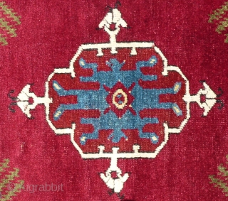 Antique late 19th century / early 20th century Kirshehir yastik rug. Beautiful colors with a cochineal field and purple accents. All colors are probably natural. Woven with an average knot count of  ...