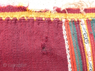 Antique Calcha poncho from Bolivia. Late 19th century or very early 20th century. Very finely woven. All wool. Beautiful colors, which are probably natural. 

Good condition for age with some small holes  ...