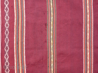 Antique Calcha poncho from Bolivia. Late 19th century or very early 20th century. Very finely woven. All wool. Beautiful colors, which are probably natural. 

Good condition for age with some small holes  ...