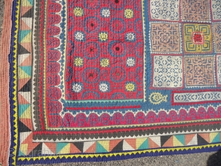 A vintage applique and patchwork ralli quilt of mid 20th century. This is a hand sewn and hand stitched traditional ralli quilt of cotton fabrics from desert Tharparkar, Pakistan.
Its size is 82"X48",  ...