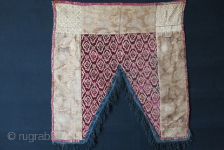 Azerbaijan - Baku Niche curtain, velvet chatma center and brocade sides with silk tassel. Plain indigo dyed cotton backing. Left side brocade has no stain- darkness is from the light not hitting  ...