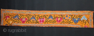 Uzbekistan - Kitap lakai suzani fragment with fine embroidery. 19th cent. Size 58" X 11" - 147 cm X 28 cm            