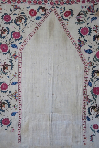 Tajikistan antique suzane, as seen on images, it has old patch form the days used for praying.. It is rare to see used ones..great colors, embroidered on hand loomed cotton and natural  ...