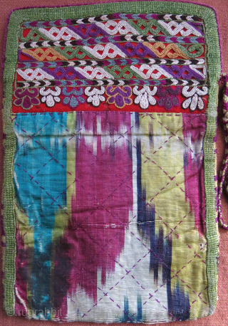 Turkmen Chodor small folding bag for valuables, silk embroidery and silk adras ikat with original securing braided string. size 8 1/2 " by 6" circa 19th cent. vedatkaradag@gmail.com     