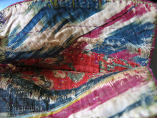 Turkmen Chodor small folding bag for valuables, silk embroidery and silk adras ikat with original securing braided string. size 8 1/2 " by 6" circa 19th cent. vedatkaradag@gmail.com     