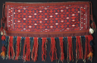 Turkmenistan Yomud Kilim Torba extra weft weave, original condition with side tassles and braids. Plain ivory kilim backing. Size : 33" X 14" - 84 cm X 36 cm without tassles   ...