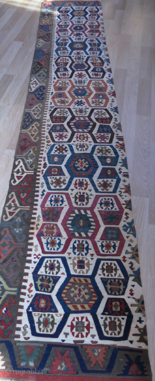 Central Anatolian half panel long Kilim. Wool and cotton mixture weave background. saturated natural colors.. Good condition circa mid 19th or earlier size, 147" X 27" - 375 cm X 69 cm  ...