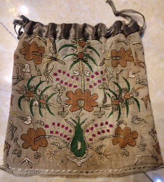 Ottoman two face is  bag, background is cotton and brouderies are silk and metal. Size 25x25 cm               