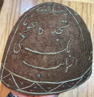 Needlework on felt made of camel wool Dervish hat.                        