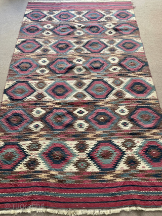 This is a Turkmen Yomud kilim but the pattern is Borchali Caucasian. It resulted in a unique different design.              