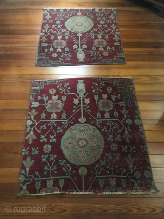 Pair of Khotan fragments, each 32" x 35", cut from a large early 19th c 3 medallion Tarim Basin carpet.
Condition good for age with areas of thinning. well saturated, compelling shale green  ...