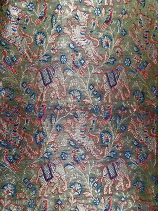 Before 1950
India for the domestic market 
Superb long silk woven shawl made in India for the domestic market probably around 1920/1930. Shawl with a background full of decorations of elephant and tiger  ...