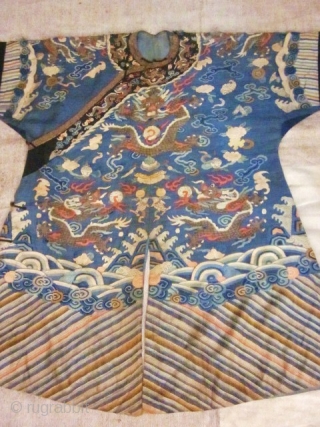 CHAOFU or Semi-Formal Court chinese robe from the Qing dynasty in Kesi (silk tapestry). it is composed of three vertical panels including one crossing the front  and closed by five buttons.  ...