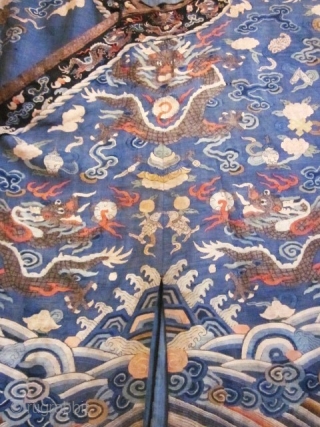 CHAOFU or Semi-Formal Court chinese robe from the Qing dynasty in Kesi (silk tapestry). it is composed of three vertical panels including one crossing the front  and closed by five buttons.  ...