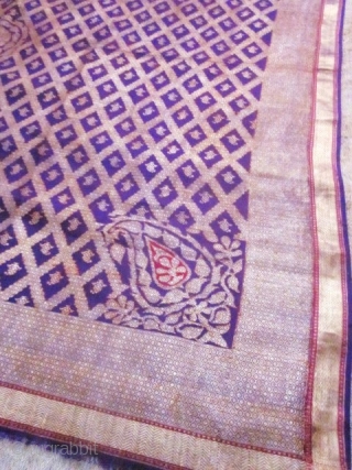 Beautiful Indian purple silk square and gold brocaded shawl originating from Varanasi in India. Varanasi or Benares in the region of Uttar Pradesh had made a specialty of this type of rich  ...