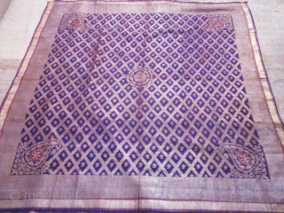 Beautiful Indian purple silk square and gold brocaded shawl originating from Varanasi in India. Varanasi or Benares in the region of Uttar Pradesh had made a specialty of this type of rich  ...