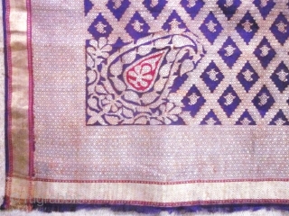 Beautiful Indian purple silk square and gold brocaded shawl originating from Varanasi in India. Varanasi or Benares in the region of Uttar Pradesh had made a specialty of this type of rich  ...