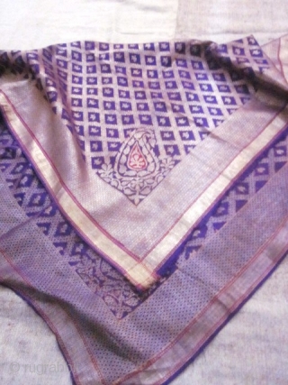 Beautiful Indian purple silk square and gold brocaded shawl originating from Varanasi in India. Varanasi or Benares in the region of Uttar Pradesh had made a specialty of this type of rich  ...