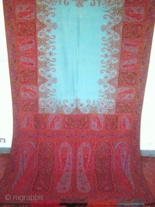 Great french turquoise Paisley shawl circa 1840.Very interesting french cashmere shawl beautifully made. The composition of interlocked paisley design is quite amazing. Harlequin boteh medallions surround a brilliant turquoise center !. Fringes  ...