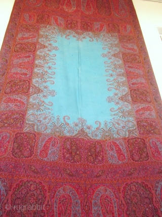 Great french turquoise Paisley shawl circa 1840.Very interesting french cashmere shawl beautifully made. The composition of interlocked paisley design is quite amazing. Harlequin boteh medallions surround a brilliant turquoise center !. Fringes  ...