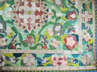 ​Chinese for export to Portugal
Silver and polychrome silk floss embroidered hanging in the Chinese manner. A large central peony is framed by pairs of birds, lotus flowers, clouds and phoenix, all derived  ...