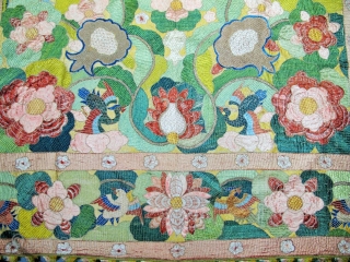 ​Chinese for export to Portugal
Silver and polychrome silk floss embroidered hanging in the Chinese manner. A large central peony is framed by pairs of birds, lotus flowers, clouds and phoenix, all derived  ...