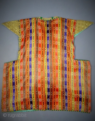 Circa 1900/1950
Tunisia
Beautiful wedding ceremony jacket from the Hammamet or Rafraf region in Tunisia. Back is in satin silk and multicolored cotton (violet, orange and red with thin stripes). Dickey with braids of  ...