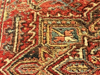 Very nice Heris rug. Size: 145 x 179 cm. Full pile. One small repair.                   