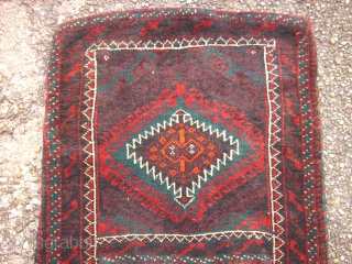 Interesting baluch Khordjin. Size: 135 x 61 cm. Good condition. Best wool.                     