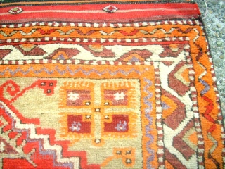 Old anatolian rug. Size: 89 x 124 cm. In good condition. I think that the one border is not re-notted, it is original.          