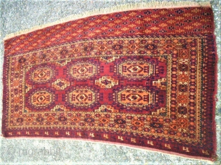 old turkmen torba. Size: 75 x 149 cm. Two edge at the top are dameged. Full pile.                