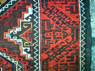 Antique Baluch rug. Size: 107 x 208 cm. With Camel-Wool. One small repair. One small area with thin pile.              