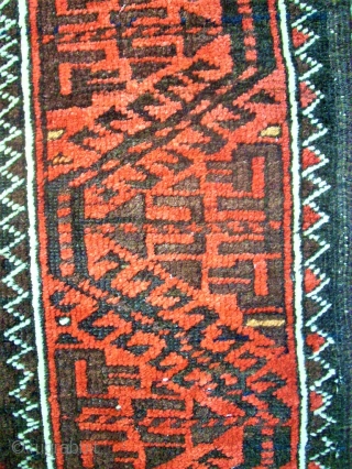 Antique Baluch rug. Size: 107 x 208 cm. With Camel-Wool. One small repair. One small area with thin pile.              